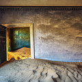 Ruins of the mining town Kolmanskop in the Namib desert near Luderitz in Namibia
